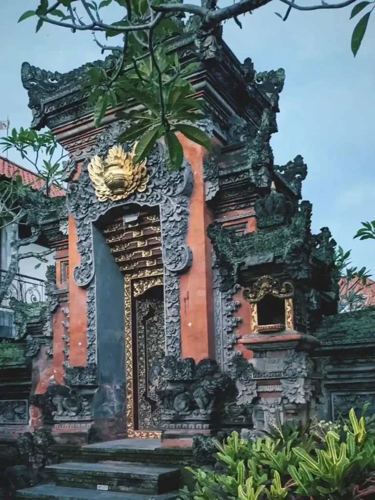 An image of a Bali-style architecture with a doorway in the center. This is specific to Bali, Indonesia.