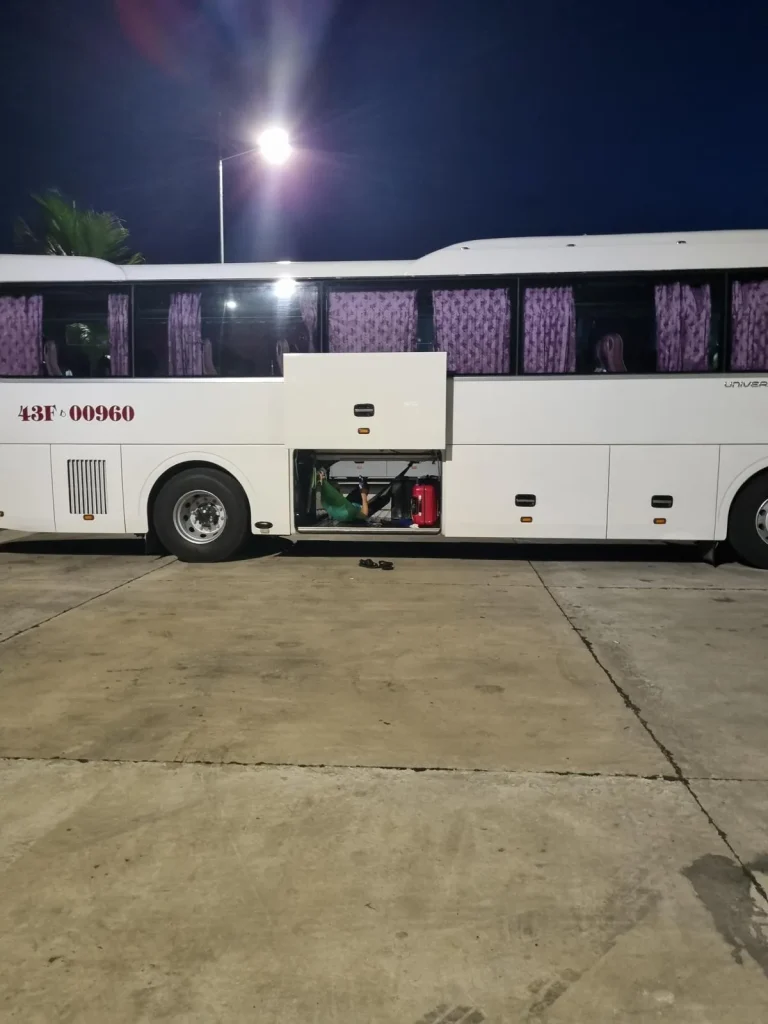 Typical full-sized bus in Southeast Asia from transporting passengers between cities or to do a land border crossing.