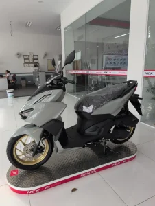 A Honda Click semi-automatic motorbike at a dealership in Cambodia. This is a brand new bike.