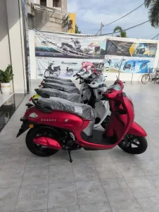 A Honda Scoopy automatic motorbike at a dealership in Cambodia. This is a brand new bike.
