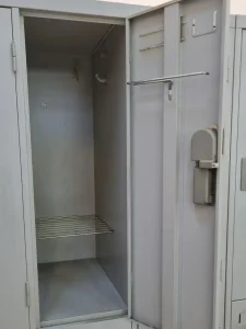 Inside of a locker that is found in a travel dorm.