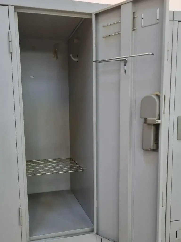 Inside of a locker that is found in a travel dorm.