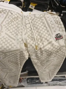 A knock-off Gucci sweat pants for sale at a department store in Southeast Asia for about ten US dollars.