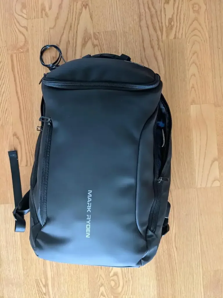 This is a front view of the Mark Ryden branded 30 liter backpack with 3 main compartments.