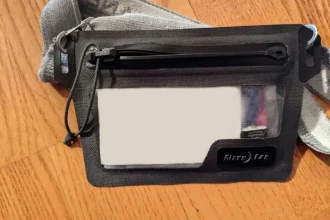 Nite Ize branded waterproof wallet that is concealable under clothing by using an attached elastic belt.