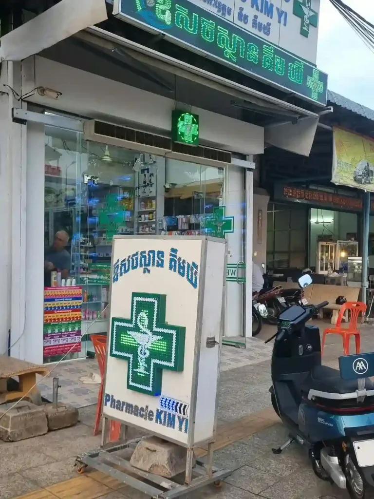 The storefront of a pharmacy in Southeast Asia.