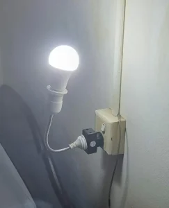 Portable and custom room lighting. This is for those who want to improve lighting in their room. It consists of a lightbulb plugged into socket with a plug. This socket & plug has a bendable extension that is about five inches long, so that a person can point the lighting in any direction they want. This is especially helpful for travelers and nomads who are moving around frequently.