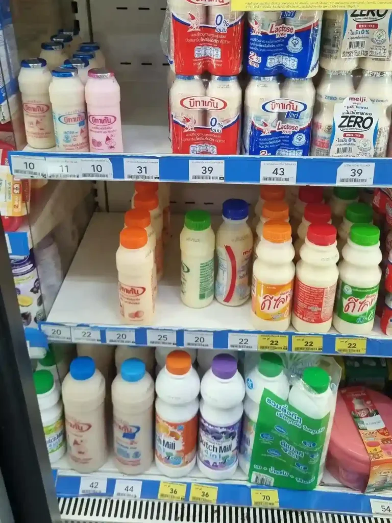 Probiotic drink on a convenience store shelf in Thailand. This is good to drink when you have an upset stomach or diarrhea.