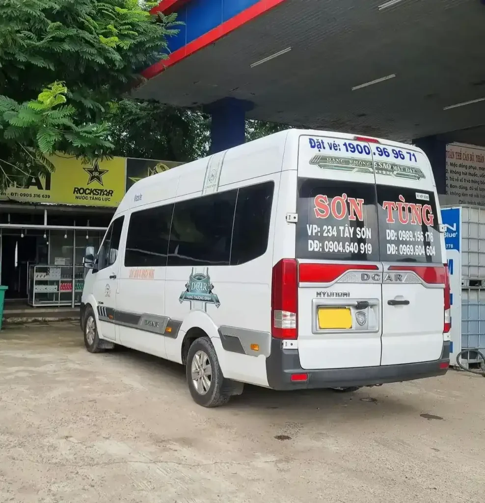 Riding by mini bus between cities in Vietnam.