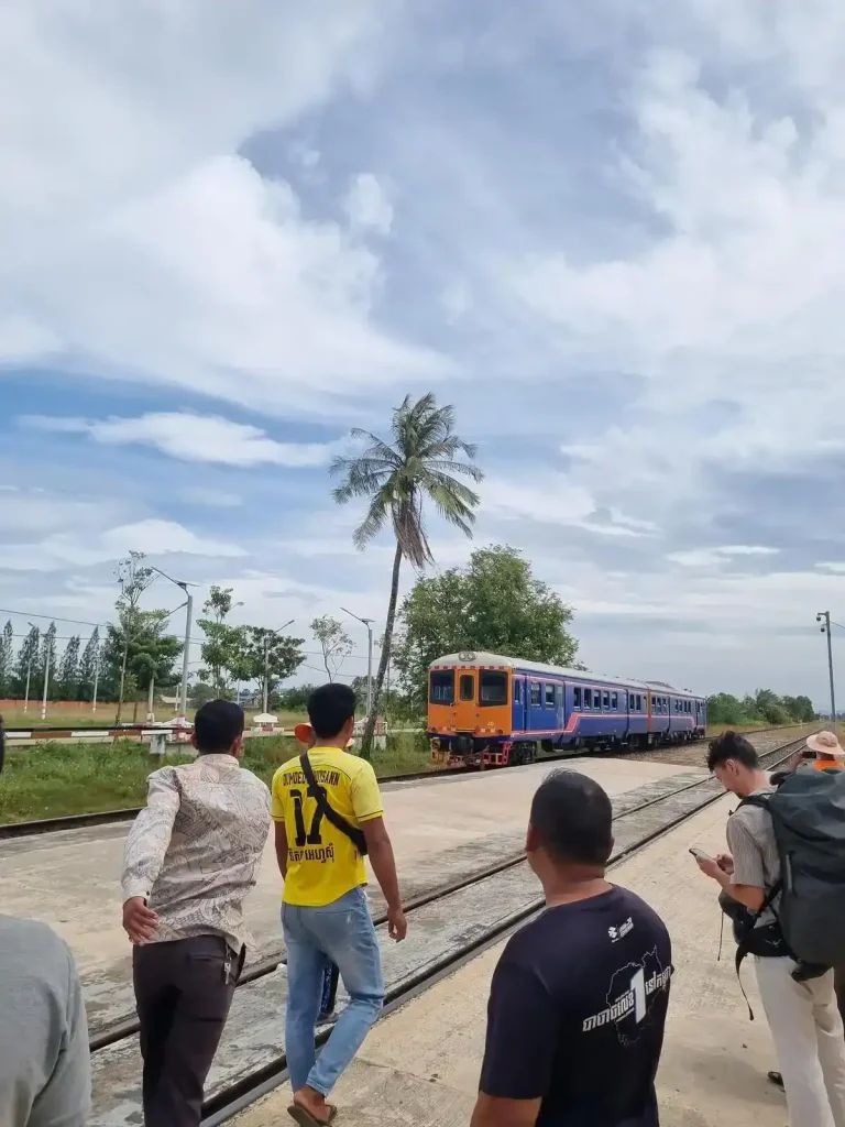 Riding by mini bus between cities in Cambodia.