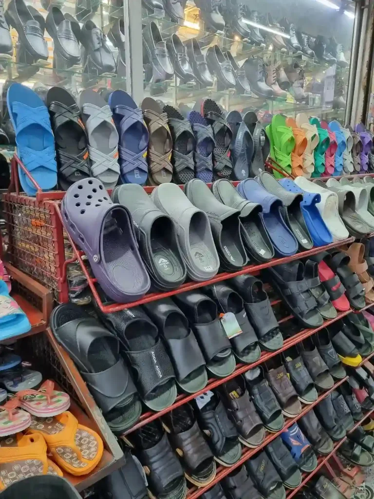 A rack of sandals for in Thailand.