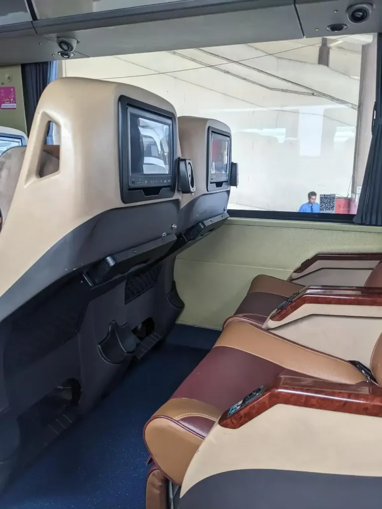 VIP bus that can be taken between cities or do a land border crossing from one country to another in Southeast Asia. Inner cabin seating.