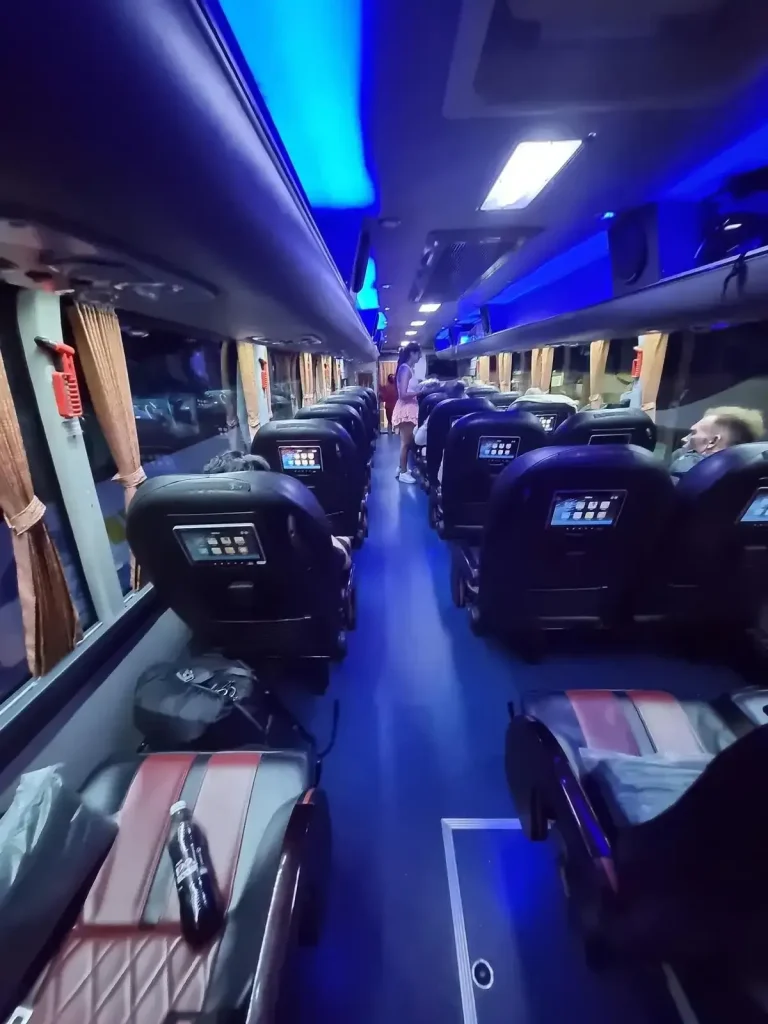 VIP bus that can be taken between cities or do a land border crossing from one country to another in Southeast Asia. Inner cabin with night lighting.
