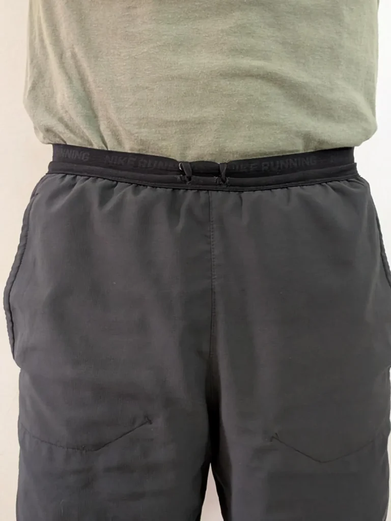 Wearing a Nite Ize branded wallet, fully concealed, with the wallet and belt tucked inside/underneath of pants.