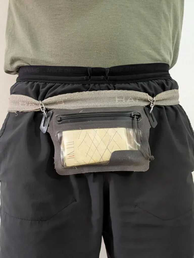 Wearing a Nite Ize branded wallet, not concealed, outside of clothing.
