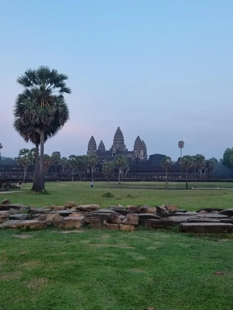 The grounds within the Angkor Wat temple complex within Angkor Archaeological Park, which is a UNESCO World Heritage Site. This image was taken at the west side of Angkor Wat, looking east at it.