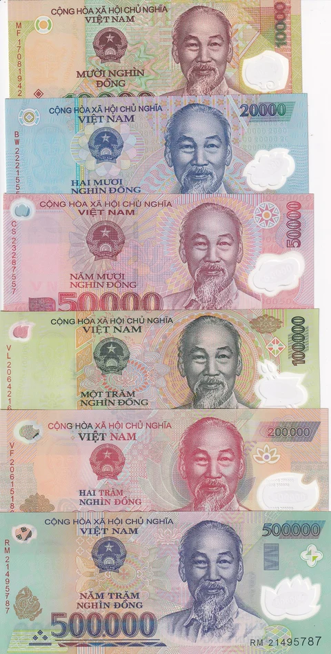 Vietnam bank notes for their currency, the Viet Dong. Bills include 10000, 20000, 50000, 100000, 200000, and 500000.