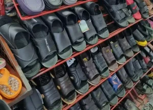 A rack of sandals for formal dress being sold in Southeast Asia. These are made of leather - real or fake leather.