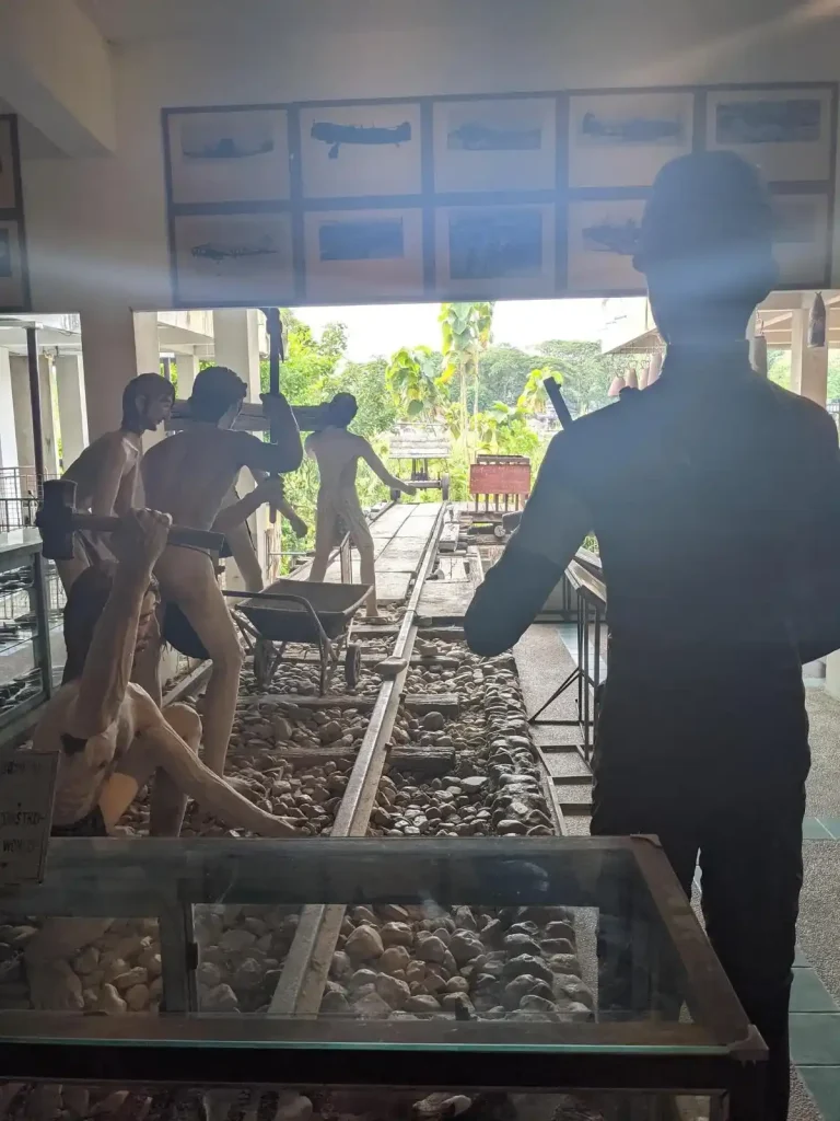 A display at the Hellfire Pass museum in Kanchanaburi, Thailand. It depicts how prisoners of war worked (slaved) on the Thailand - Burma railway construction, and were guarded by Japanese soldiers during World War two. Located in Kanchanaburi, Thailand.