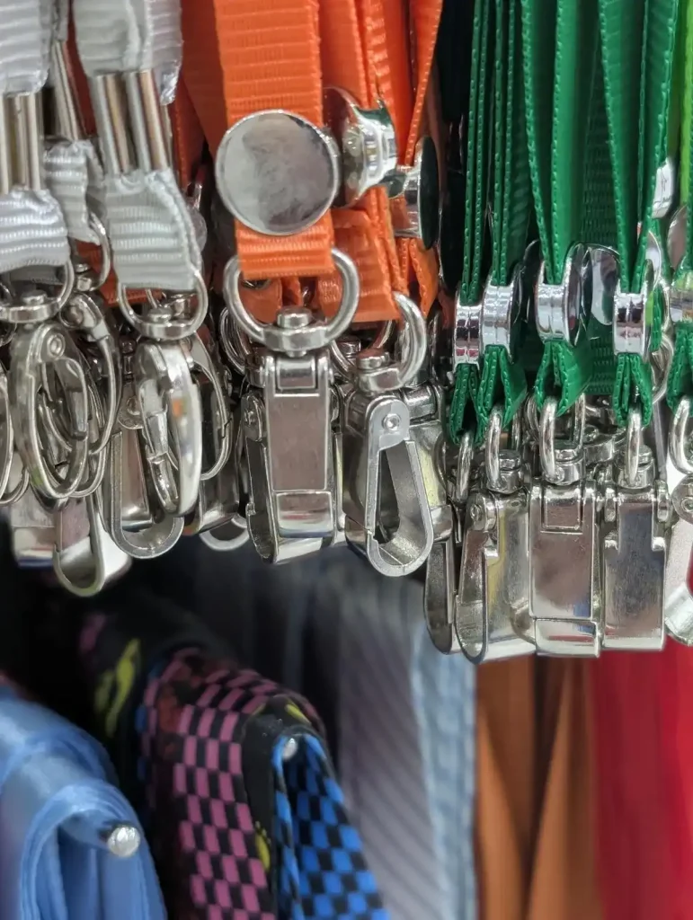 A lanyard that has a quick-attach hook (similar to a rock climbing clip) on one end to clip things onto it such as keys, badge I.D.'s and name cards, etc.