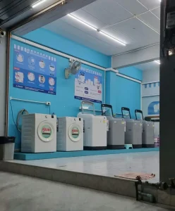 On-site laundry at a rental in Southeast Asia. Washing machines and driers are both available.