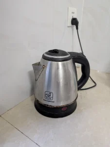 A water kettle. This is often, but not always, included with furnished housing in Southeast Asia.