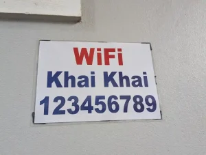 A sign with the Wi-Fi password. This is often, but not always, included with furnished housing in Southeast Asia.